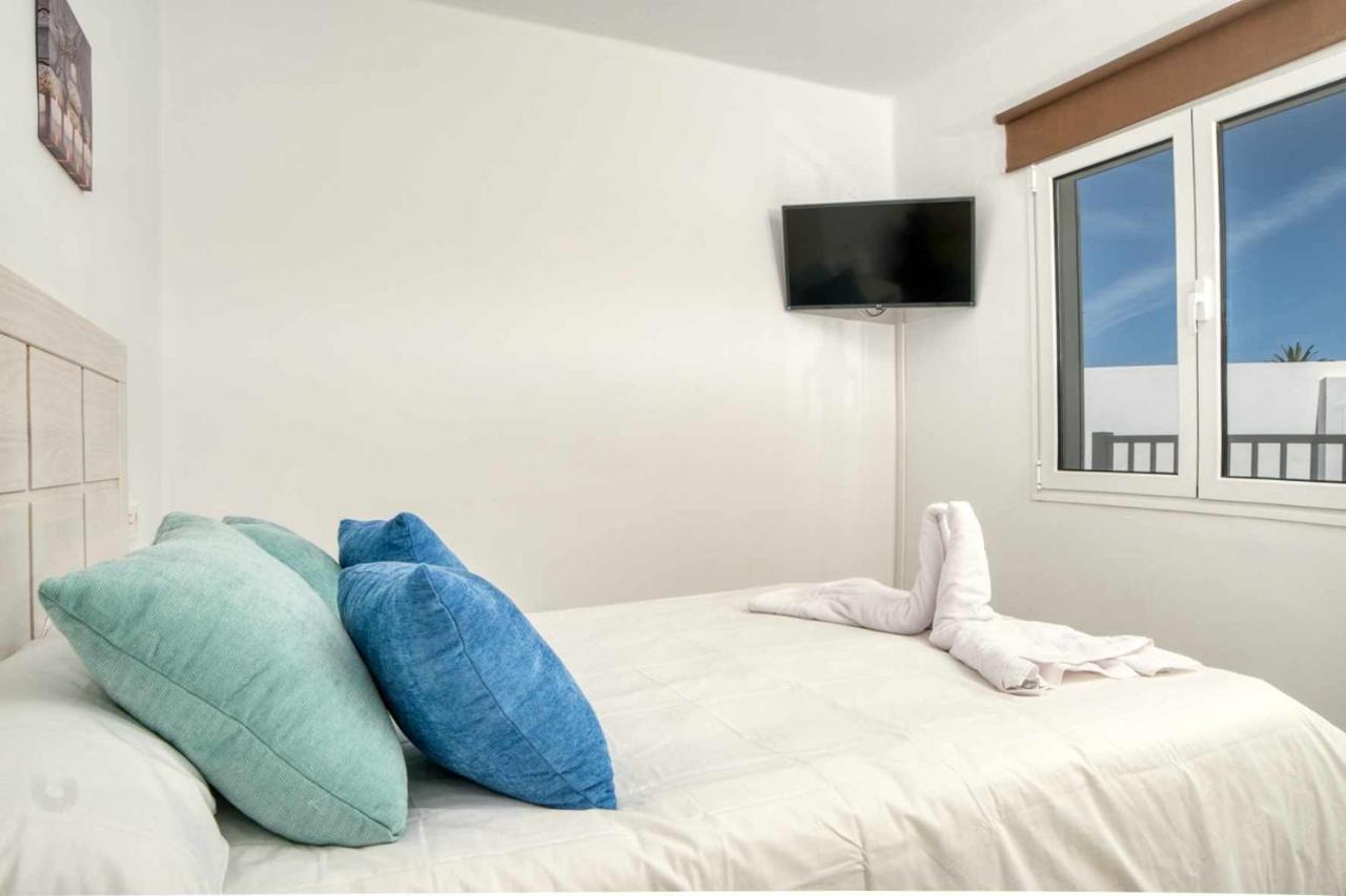 Luminosa Vivienda Vacacional Con Vista A La Piscina Costa Teguise Eksteriør billede